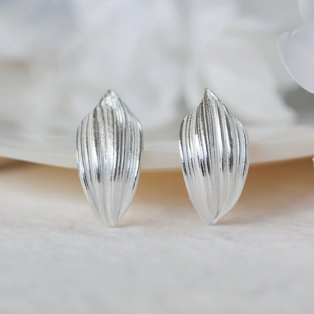 Textured silver petal studs