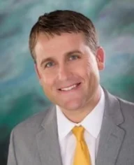 Dr. Zachary Kopf Dr. Kopf grew up on a ranch near Lexington, Nebraska. He has a wife, Carrie, and a dog, Yogi. He attended the University of Nebraska at Kearney for undergraduate school, and went on to graduate school at the University of Nebraska, Medical Center College of Dentistry where he graduated in 2009. Dr. Kopf loves the outdoors, he spends a great deal of his time hunting, fishing, and entertaining friends.