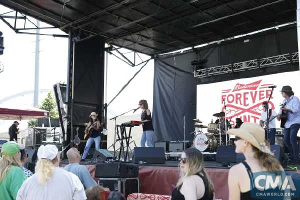Lari and band CMA Fest's Forever Country stage 2017