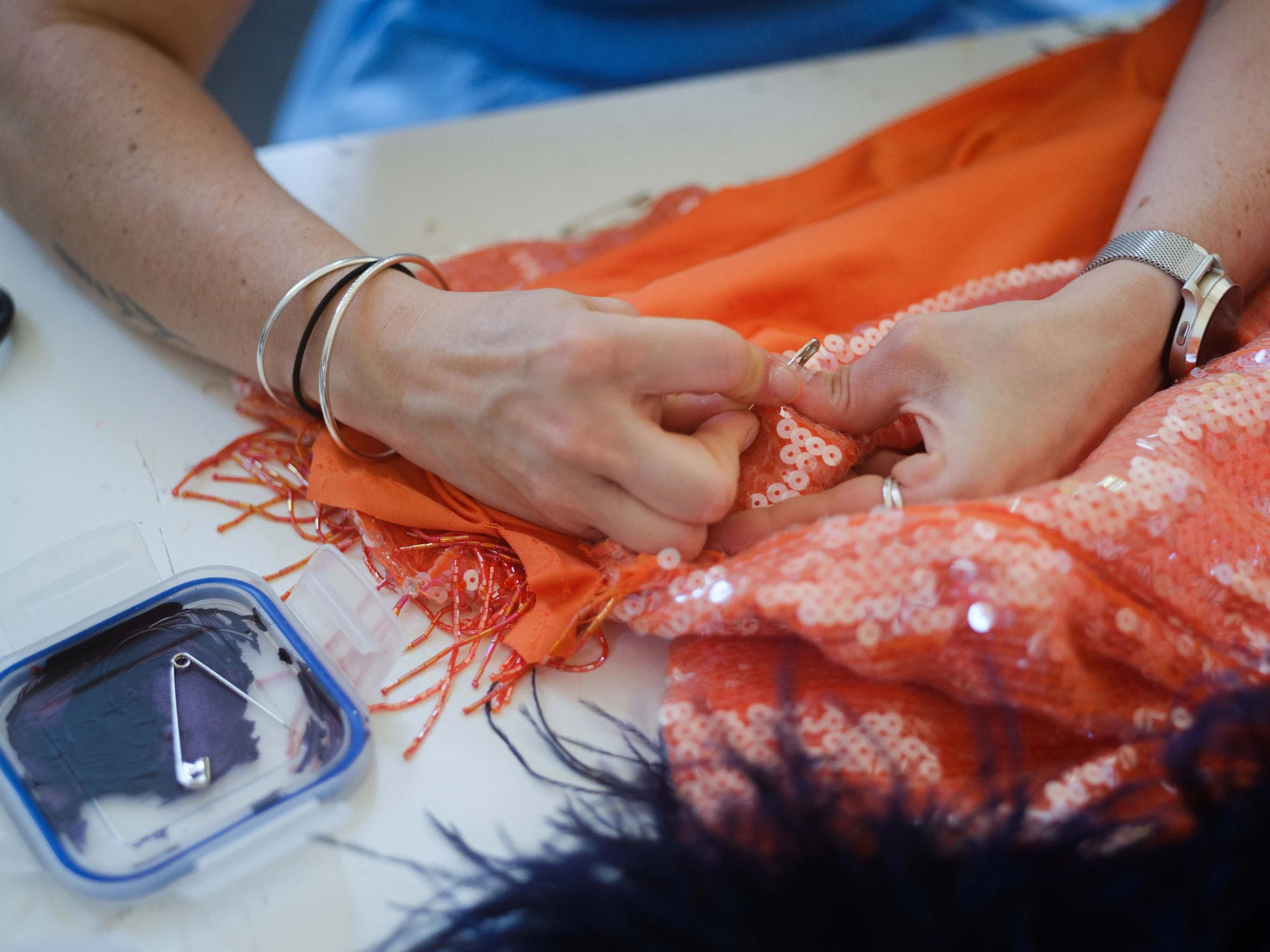 Sienna Hayes of Sewn by Sienna working  sequins in her costume making studio at Hotel Elephant, St John’s Walworth Studios in Elephant and Castle.