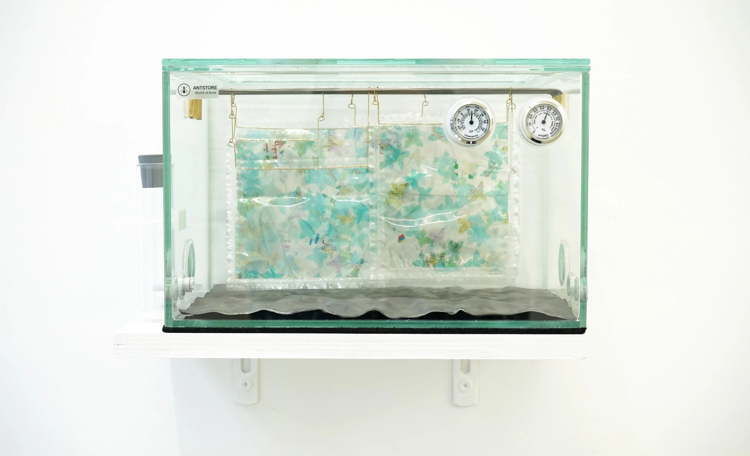 1/2 Land, 1/2 Water, Nr.3, 2018, EBV Dateipauschale, Ante starter, Lead, Plastic bag, Iron wire, Copper, 25 x 15 x 16 cm