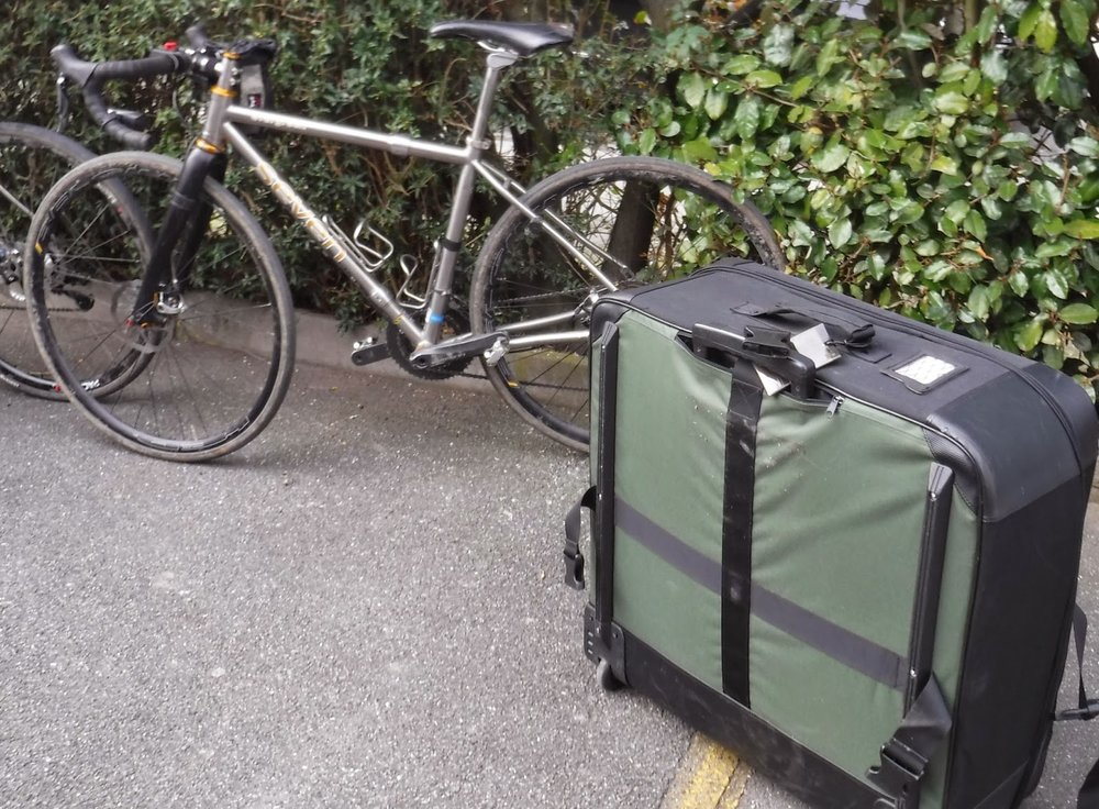 The Evergreen bike in the background was just unpacked out of the case in the foreground in 30 minutes. This particular Evergreen traveled to France for another reason: to ride ALL of the cobbles of the Paris Roubaix course!