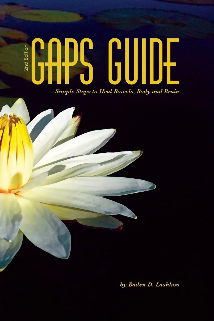 Book cover titled 'GAPS GUIDE', 2nd Edition, with subtitle 'Simple Steps to Heal Bowels, Body and Brain,' by Baden D. Lashkov. The cover features a large white water lily flower on a dark background.