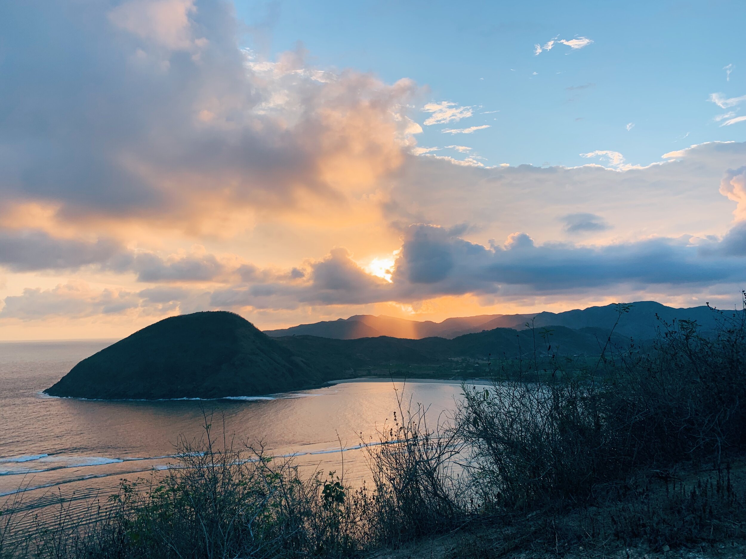  Sunset from the hilltop overlooking Pantai Mawun. The spot where Brian proposed. South Lombok. 