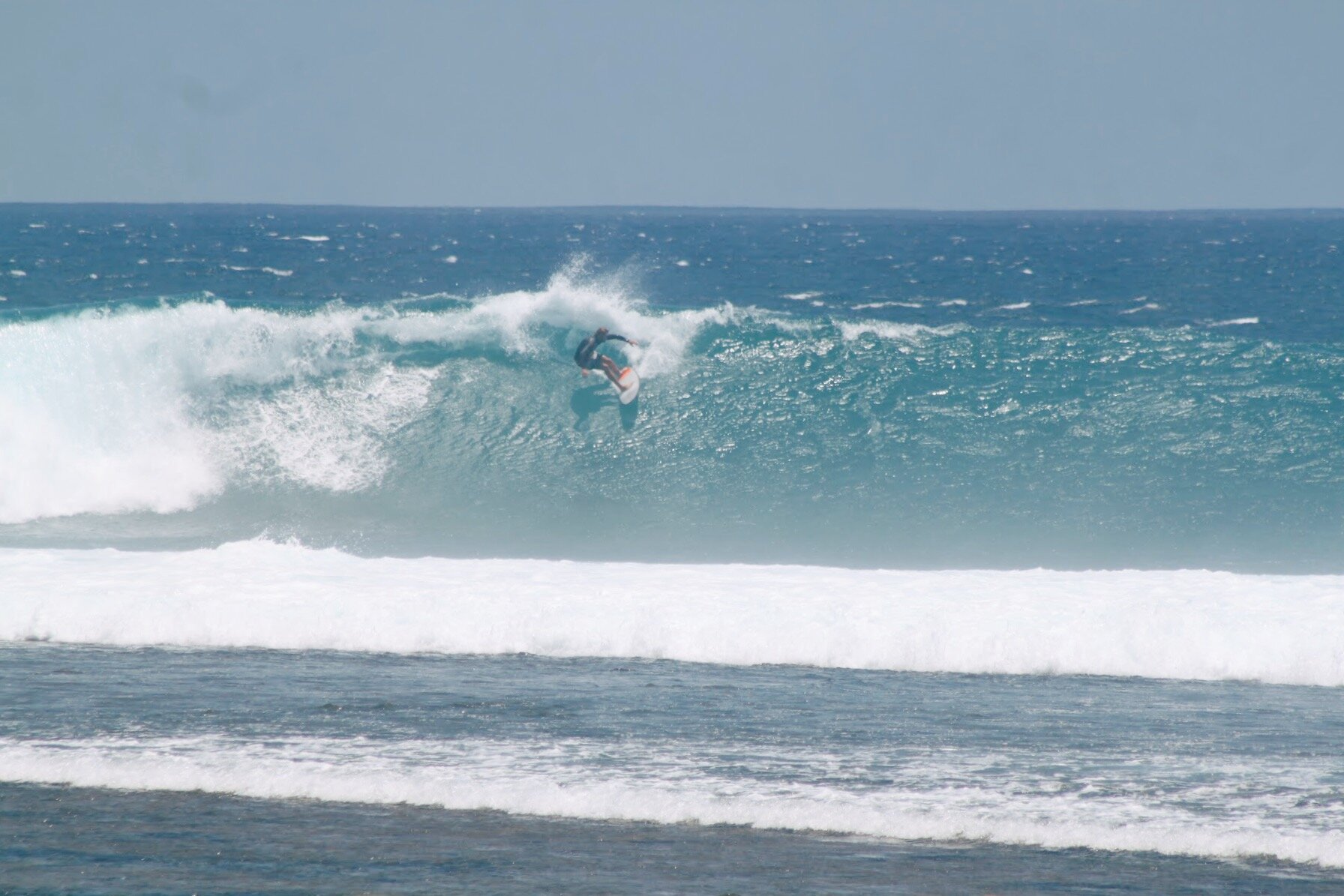  Brian on a good size wave at Desert Point. Unfortunately the wind didn’t cooperate this afternoon. 