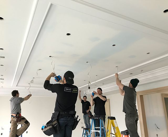Close to 270 pot lights in this house means all hands on deck to get a jump on finishing. 
___
#torontoelectricians #electricians #electricalcontractor #electrical #newbuild #torontobuilds #customhome #torontocustomhomes #torontohomes #renovator #tor