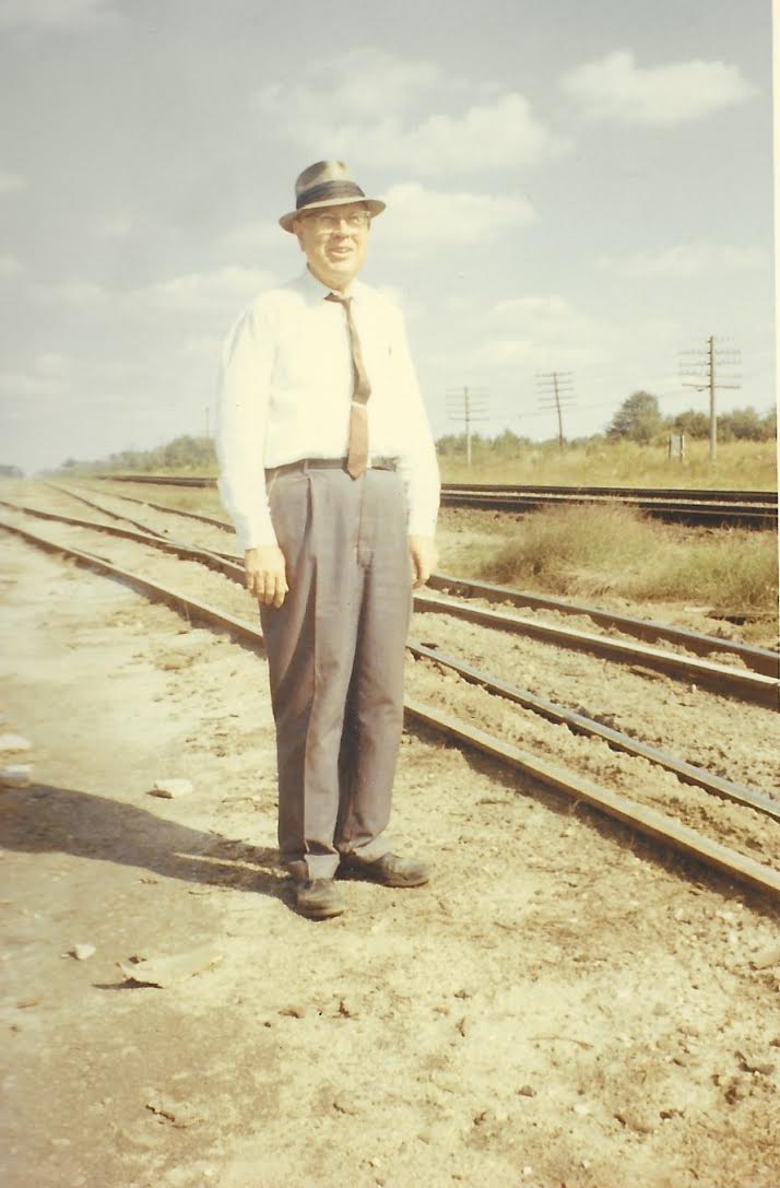 Not a childhood photo but it reminds me his always present hat and railroad ties.