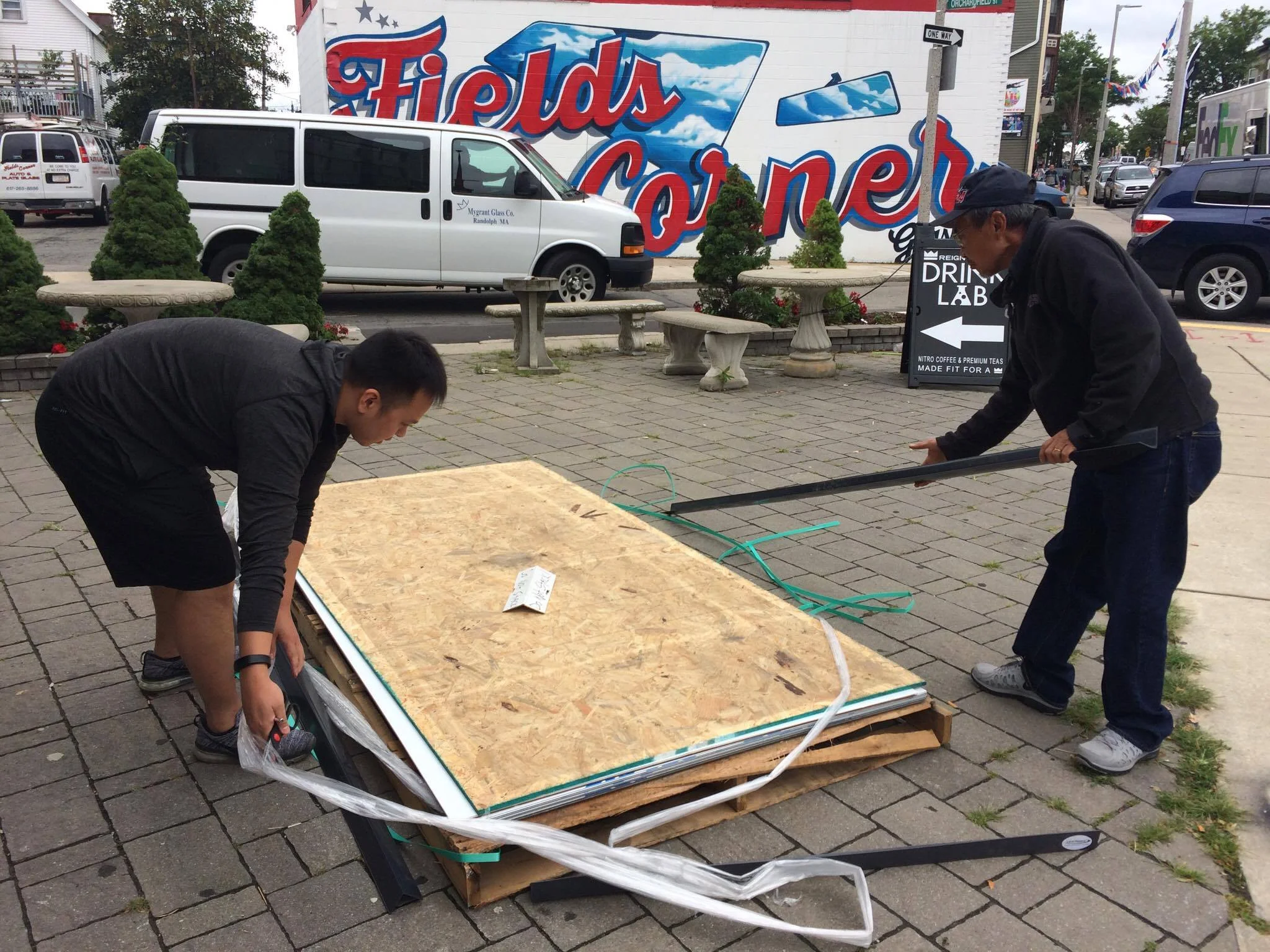 Tam and Hung are taking care of the board upon its arrival!