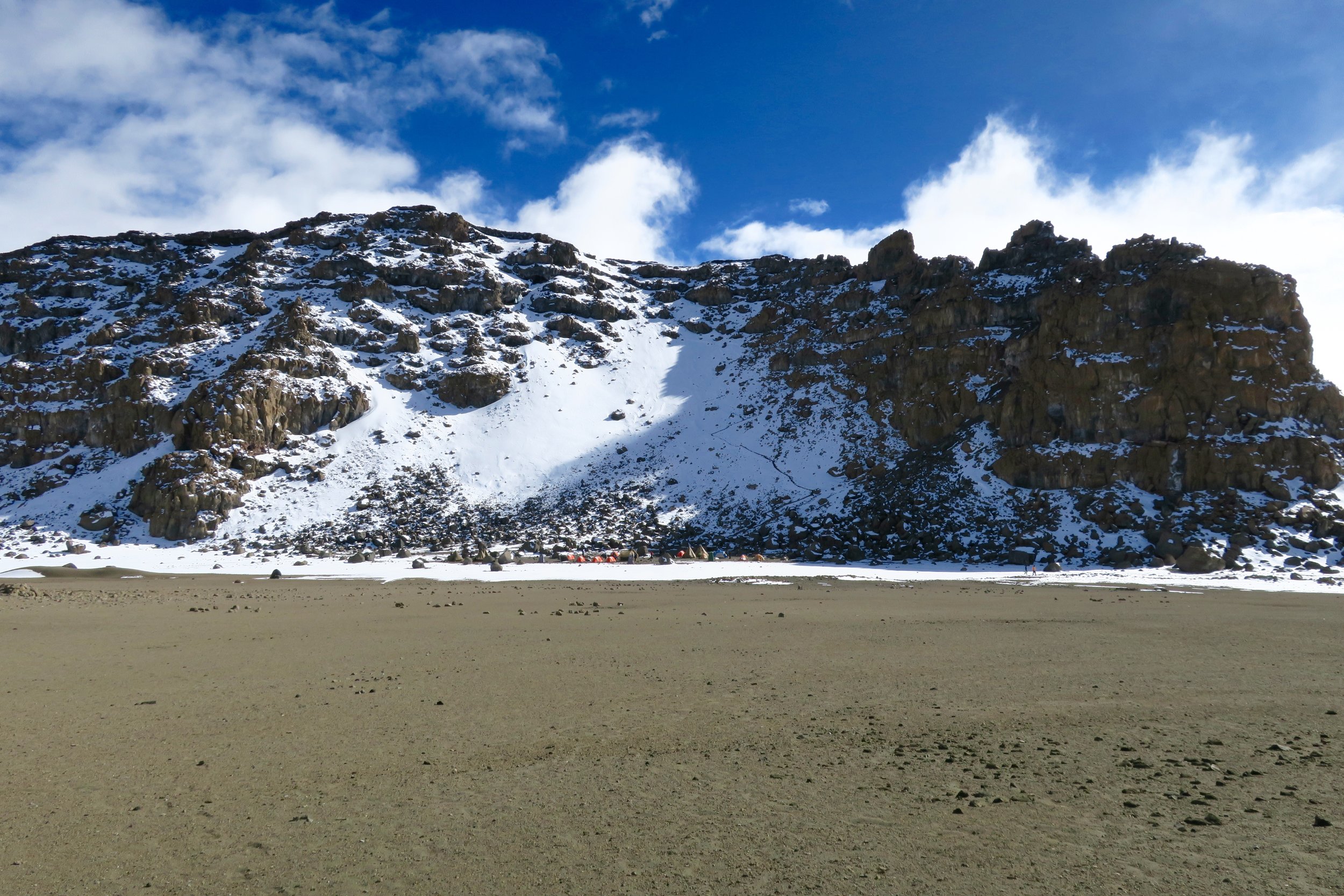 The Western Breach get's its name for the whole it makes in Kilimanjaro's summit crater. 500 feet above our camp is Africa's highest point, the highest of the walls that form the top of this volcano.