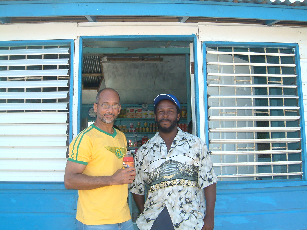 Visiting a shopkeeper customer in rural Jamaica.