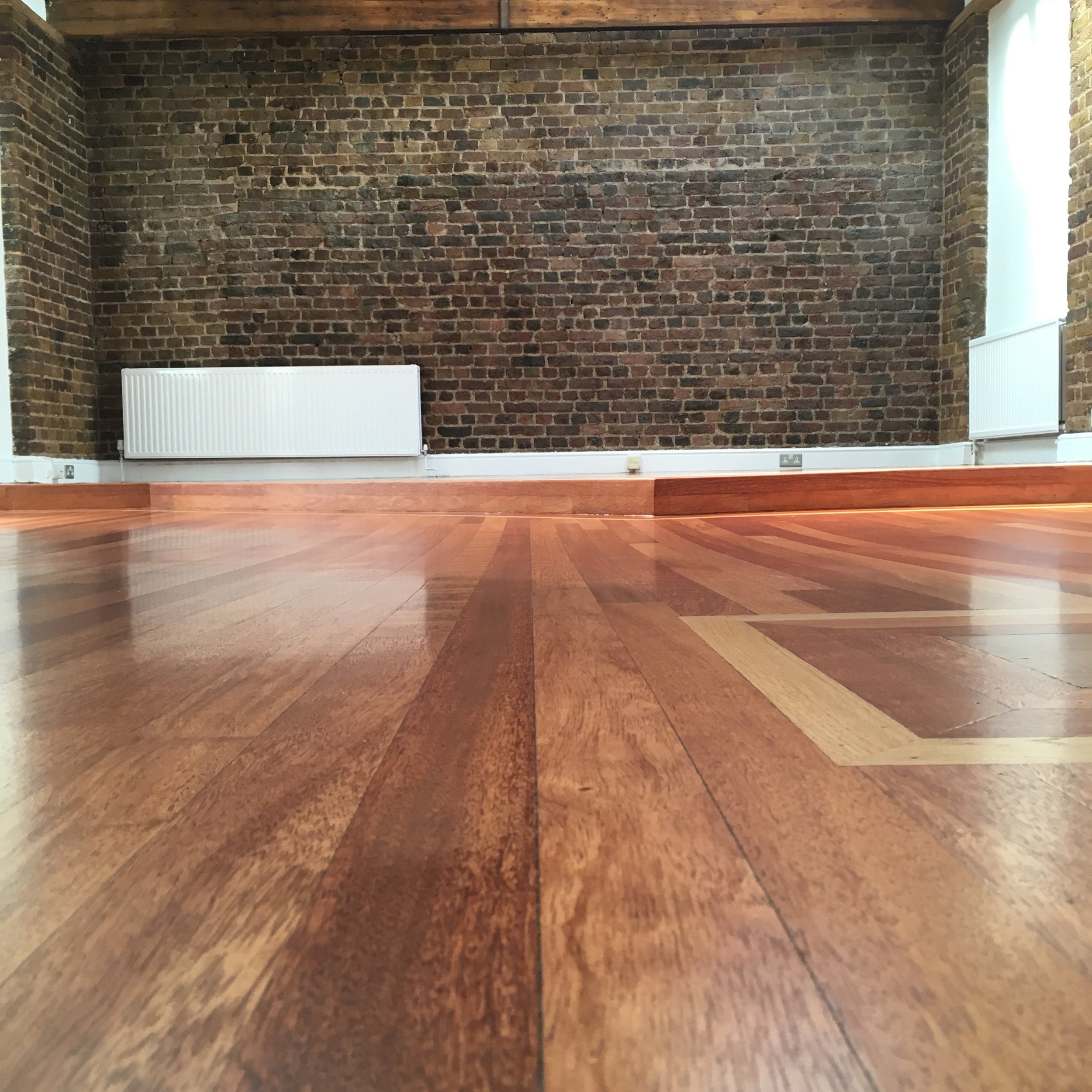 Mahogany floor finished with water based lacquer