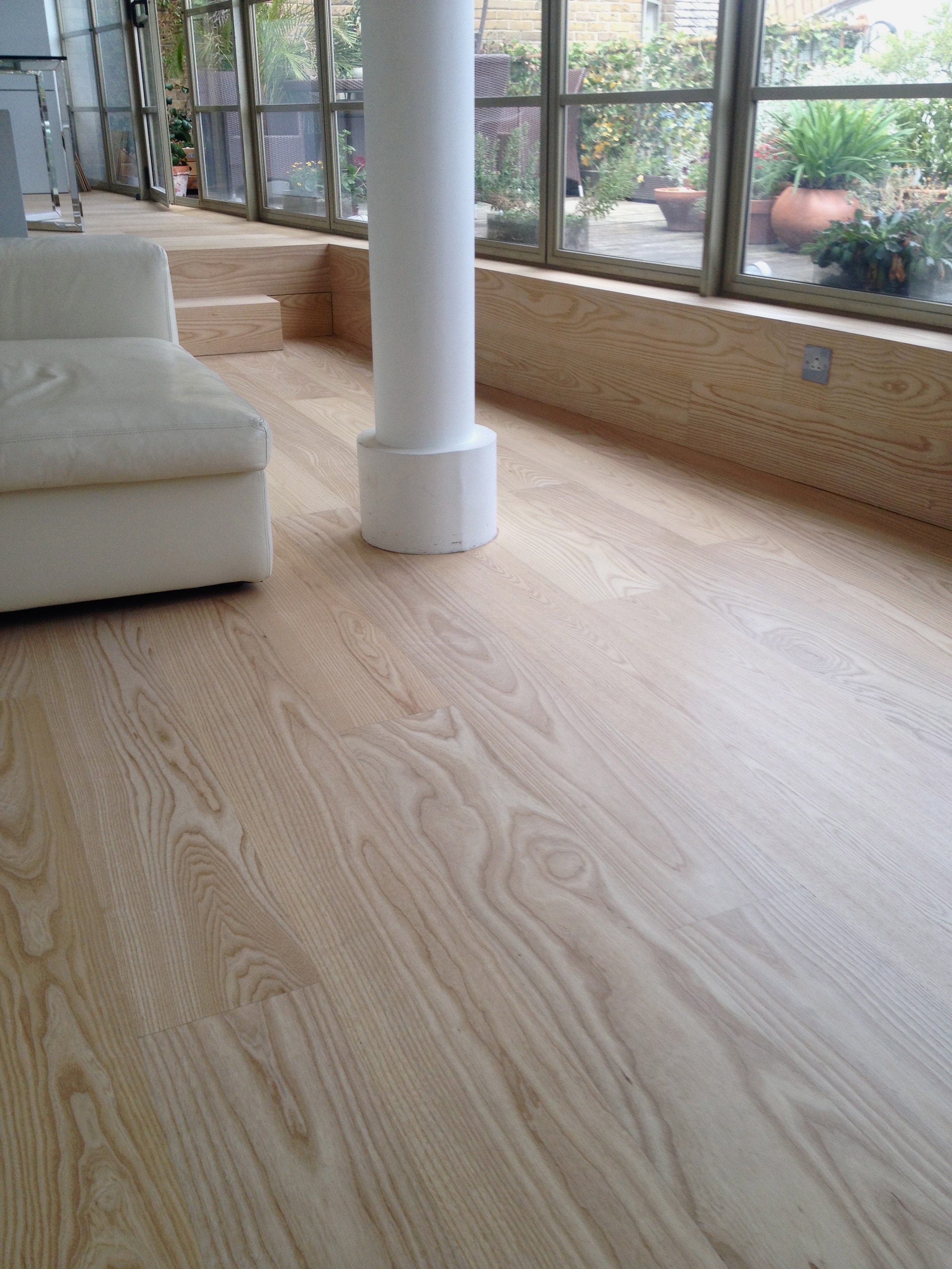 Ash floor with natural finish.