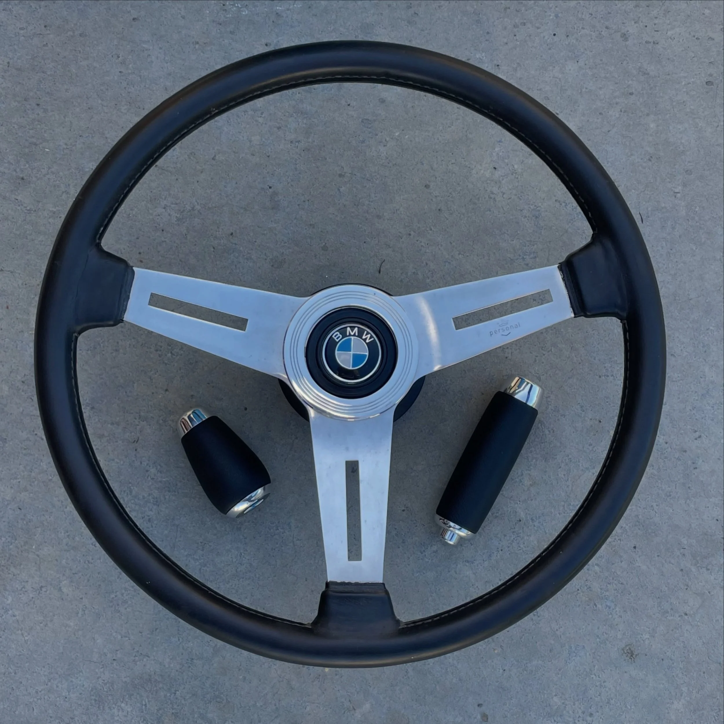 We just finished up this leather &amp; polished aluminum knob &amp; handle set&hellip;but before sending it out to the customer I just had to get a shot of them as a &ldquo;control package&rdquo; along side this rare 380mm personal wheel&hellip;might