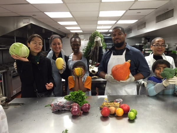 An “Iron Chef” class at Association to Benefit Children where parents created meals utilizing the contents of farm fresh produce without knowing what the ingredients would be. Photo credit: Association to Benefit Children