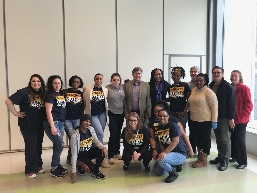 (left to right top row) Food Advocates Stacy Espinoza, Emilie Quinones, Shadina Arnett, Raquel Guadalupe, Jasmina Kolenovic, Dean Sachs, VP for Enrollment and Student Affairs, Lynette Cook-Francis, Laura Blackwood, Professor of Food Justice, Robert Garot, Director of Health Services, Malaine Clarke, Director of Community Outreach Declan Walsh, and Senior Director of Student Affairs, Dana Trimboli. (left to right bottom row) Food Advocates Marleny Pimentel, Shannon Jensen, Ronnette Cox, and Brittany Applewhite.