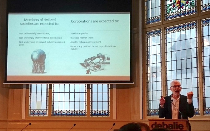 Above, Nicholas Freudenberg speaks on corporations and health at DeBalie, a public lecture hall in Amsterdam.