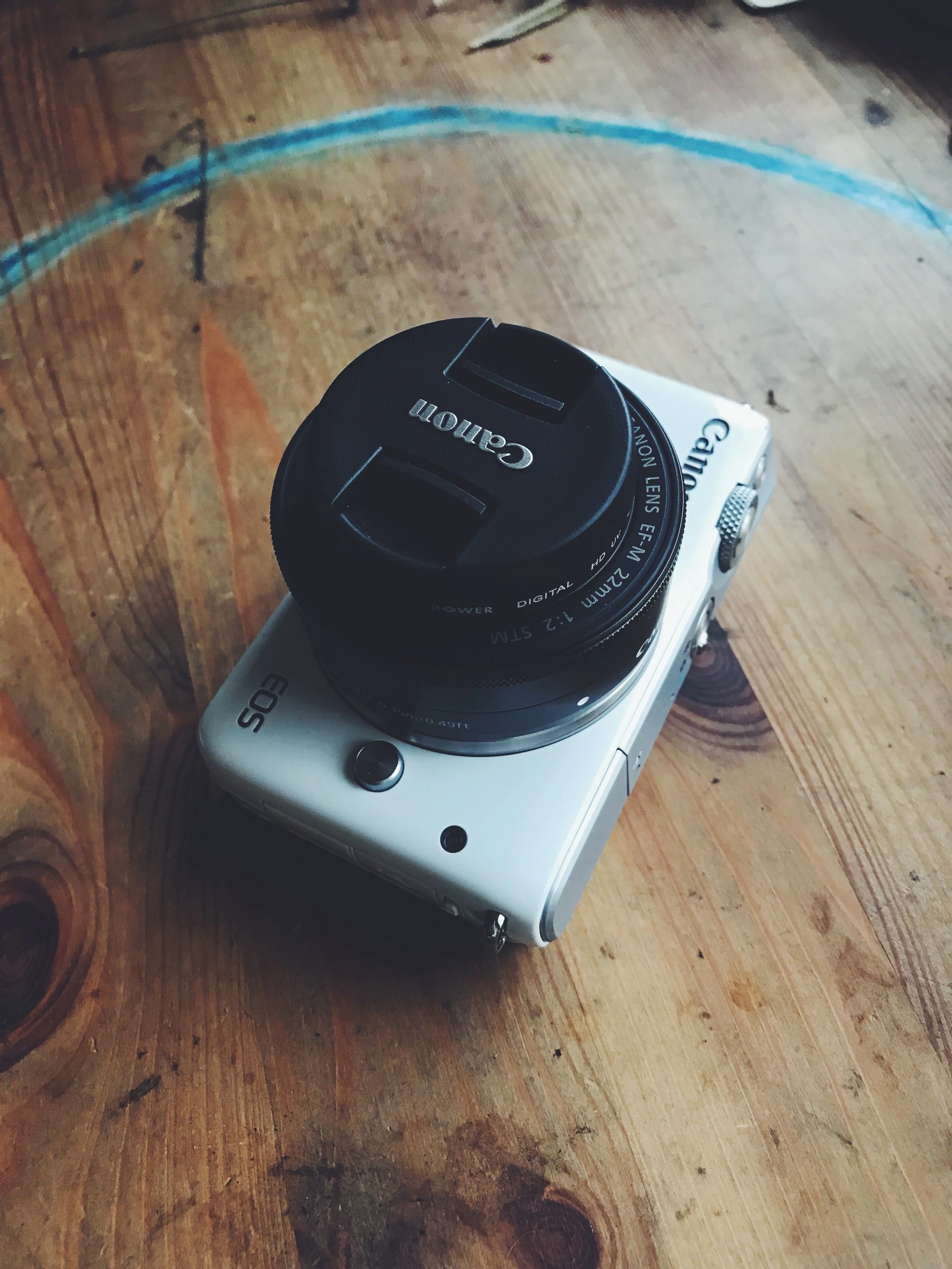 The Canon Eos M10 with a 22mm lens.
