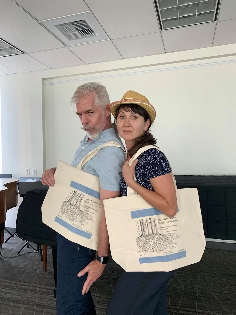 Phil and Andrea with their International Phonetic Situation Tote Bags, designed by Simon Masterton!