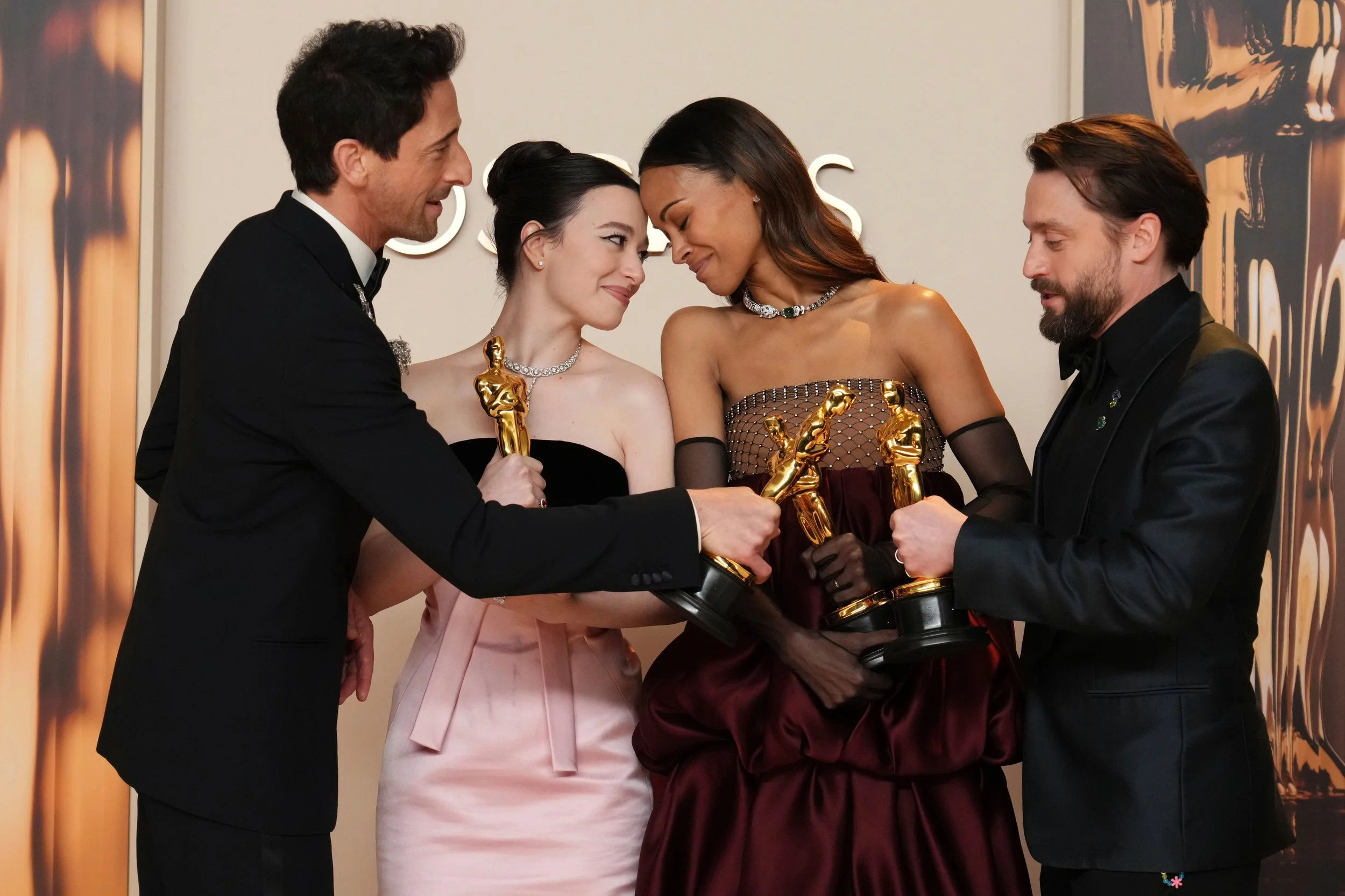  Adrien Brody, from left, winner of the award for best performance by an actor in a leading role for "The Brutalist," Mikey Madison, winner of the award for best performance by an actress in a leading role for "Anora," Zoe Saldana, winner of the awar