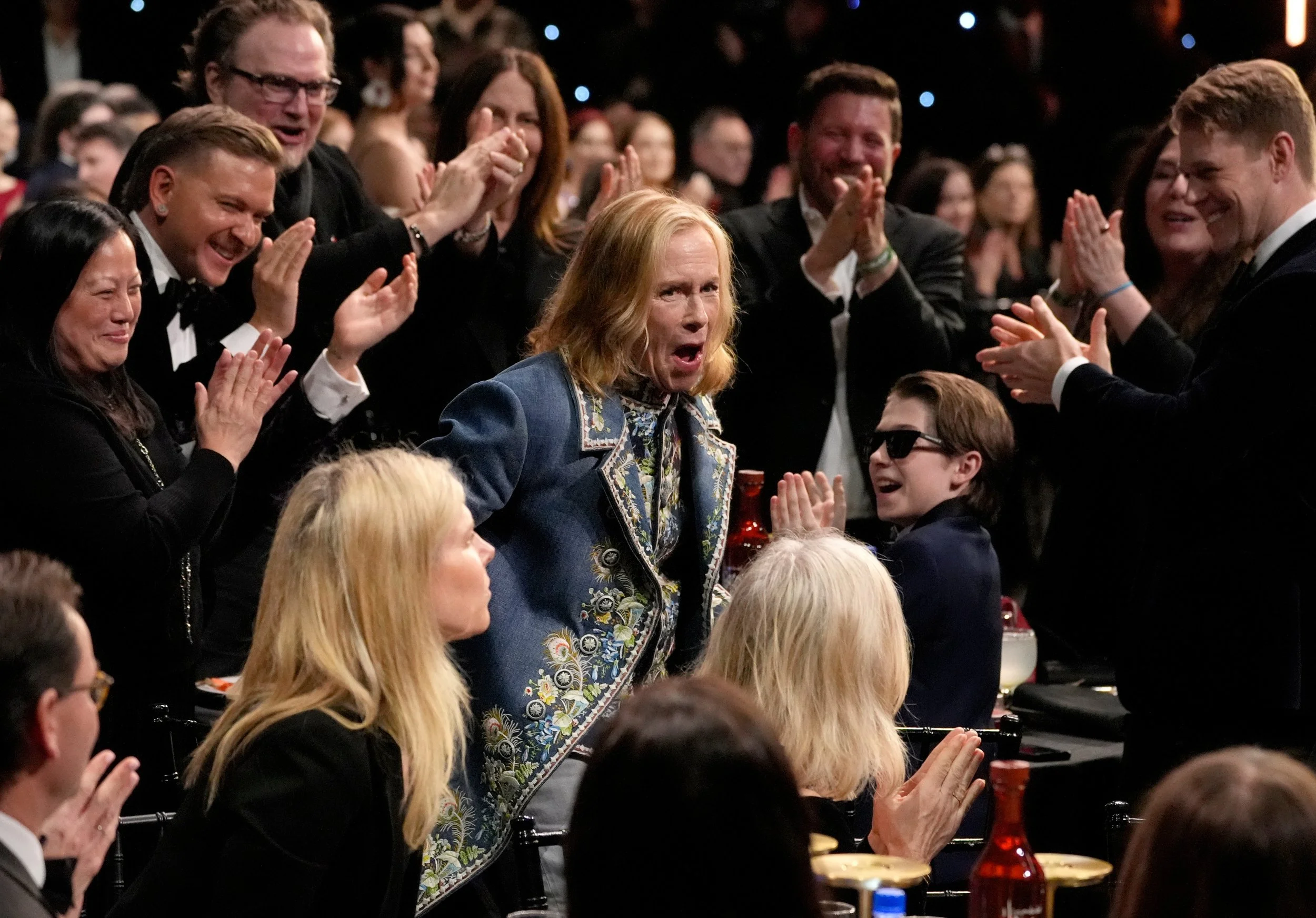  Amy Madigan, center, reacts to winning the award for best supporting actress for "Weapons" during the 31st Annual Critics Choice Awards on Sunday, Jan. 4, 2026, at The Barker Hanger in Santa Monica, Calif. (AP Photo/Chris Pizzello) 