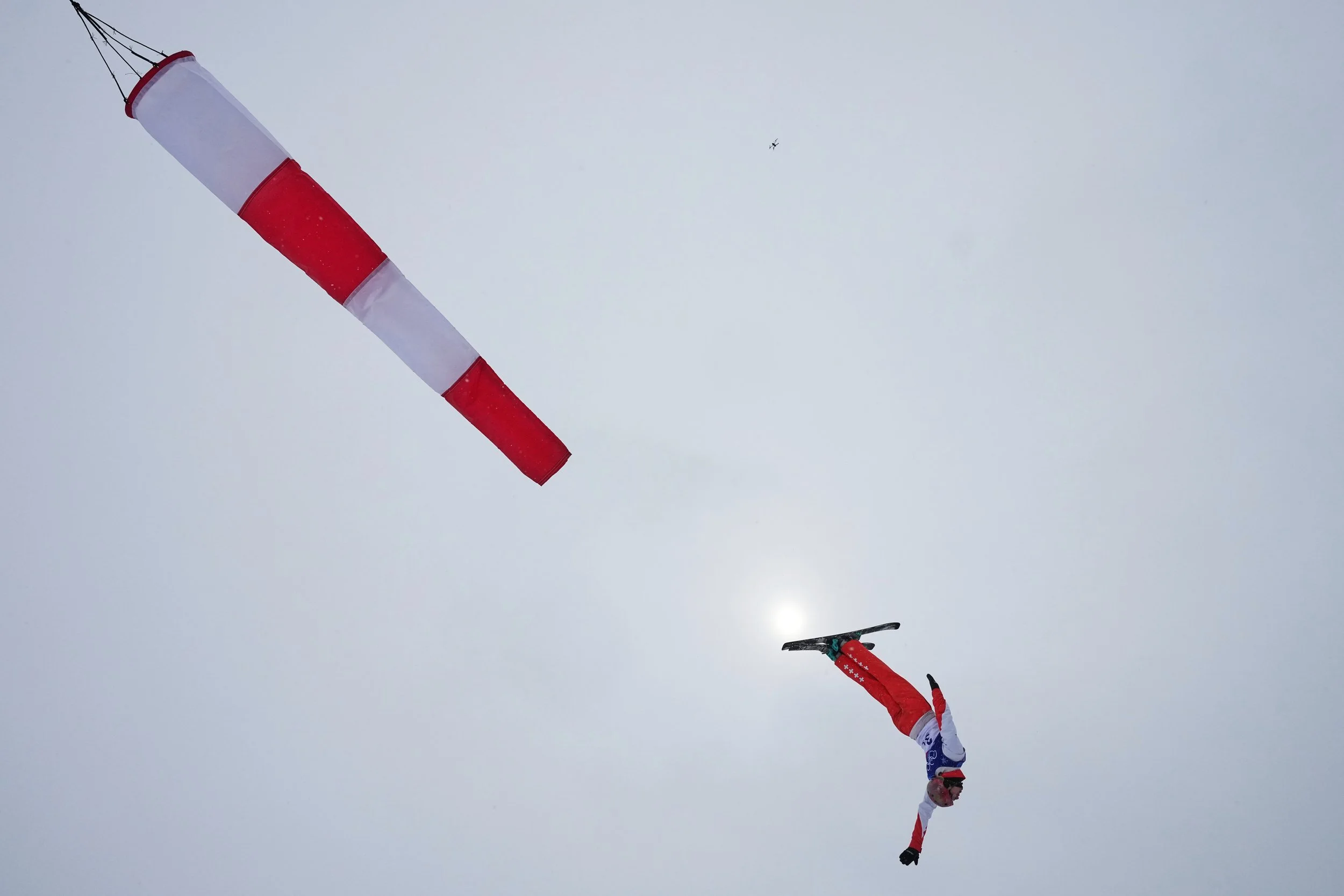  Switzerland's Pirmin Werner competes during the freestyle skiing mixed team aerials final at the 2026 Winter Olympics, in Livigno, Italy, Saturday, Feb. 21, 2026. (AP Photo/Gregory Bull) 