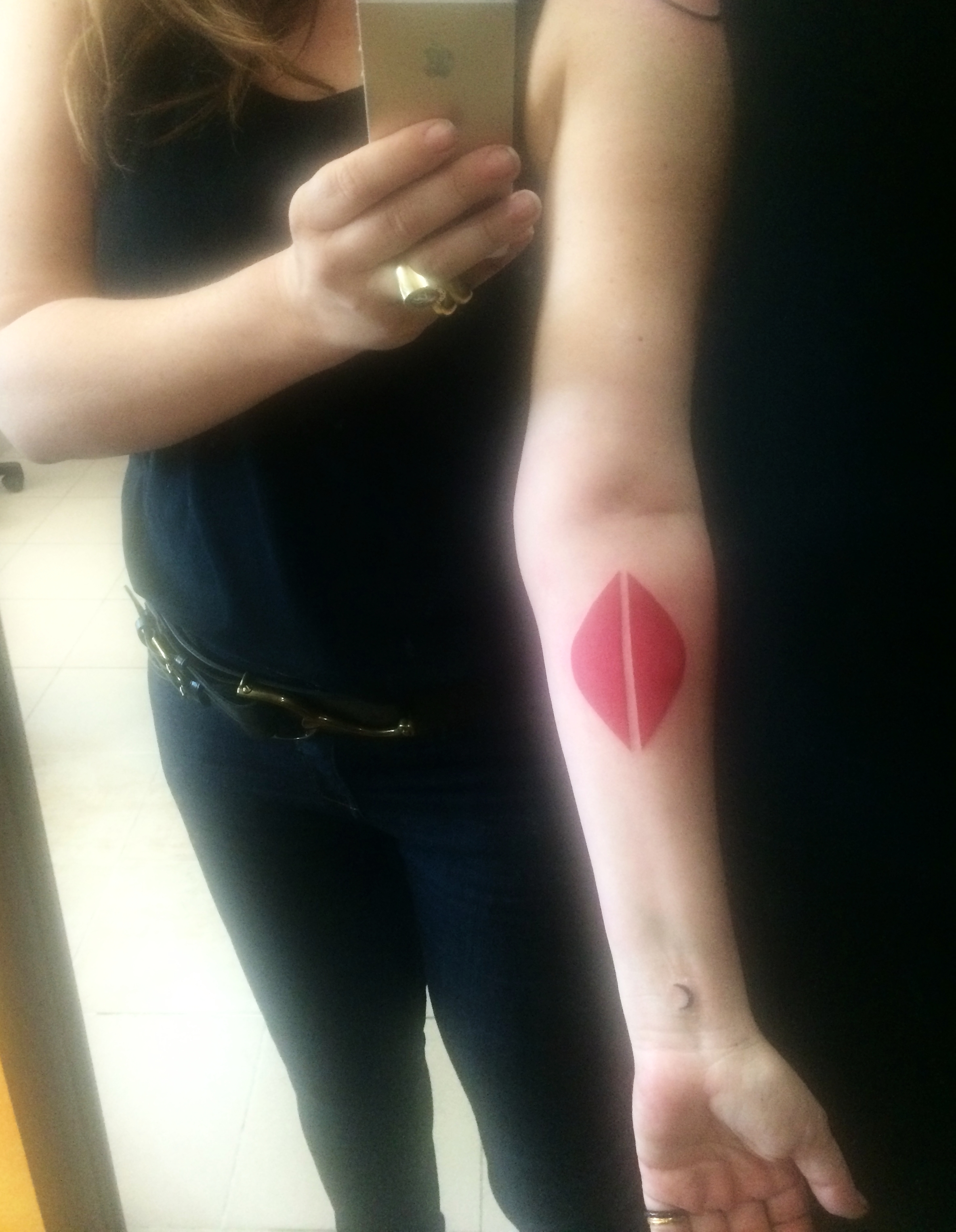  My work focuses on the transformation of symbols of power related to women into signs of submission […] How many women, like their blood, have to hide, turning their voices into whispers?  I choose to draw an icon of femininity and feminine force. This tattoo in my own flesh is my medal, not a medal-object but a medal nonetheless, if not as recognition at least as reminder of the values I had decided to extol.  The medal presented is a representation of that iconic symbol, a stencil that allows it to be drawn in the body or clothes and other material as one chooses. It can be worn as a necklace but its main use is that of model for multiple manifestations by anyone who wishes.  The medal I created celebrates women’s shameless power.   