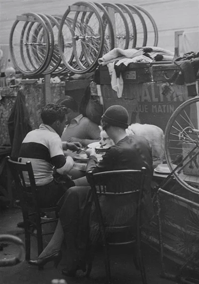 Brassai, (1899-1984), Untitled (Eating at the Velodrome), circa 1932, silver gelatin print