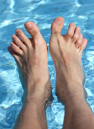 29578942_S-water_man_feet_hammer_toes_pool_feet_ankles_soak.jpg