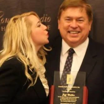 Christy Watkins-Walker with her father, the late Jeff Walker, with his Country Radio Broadcasters President's Award. In November 2015, the Country Music Association renamed the CMA Global Artist Award to the JEFF WALKER Global Artist Award to honor his contributions to the international country music industry.