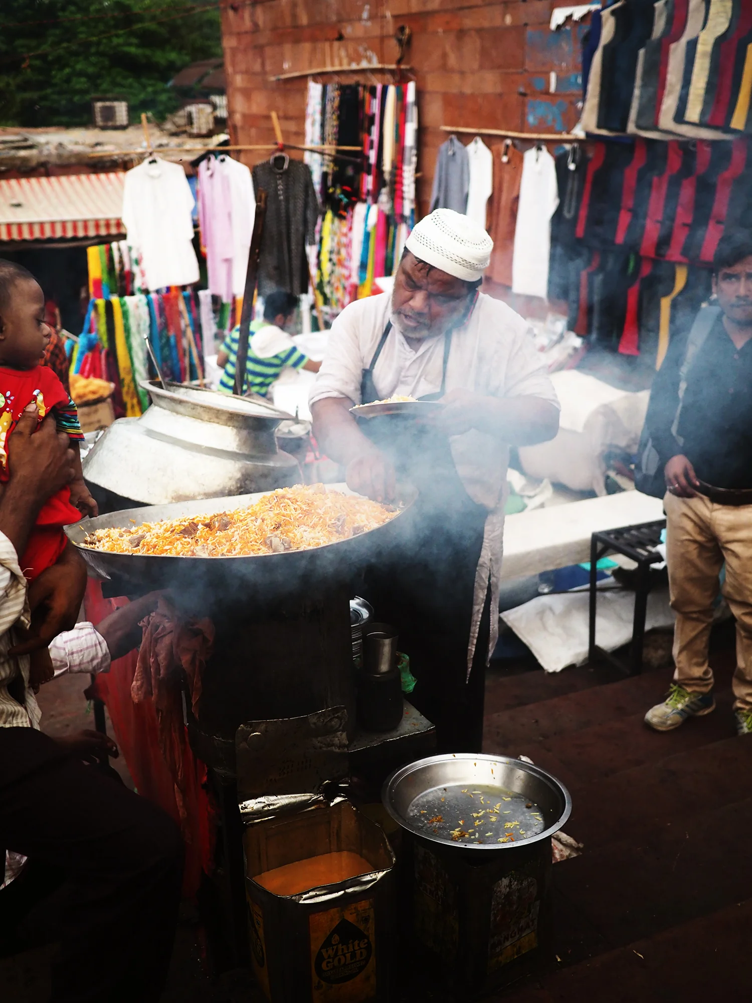 Hot biryani sold on the streets outside the Masjid.