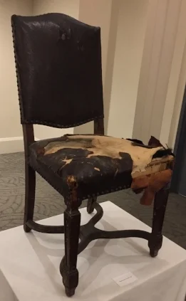 A chair dating to the 1929 opening of the Arcadian Court, looking a bit worse for wear...