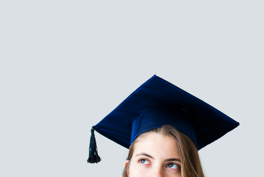A girl wearing a blue graduation hat