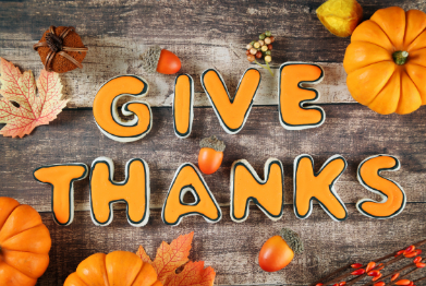 Give Thanks with fall decor around the letters