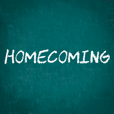 Homecoming written on a chalkboard