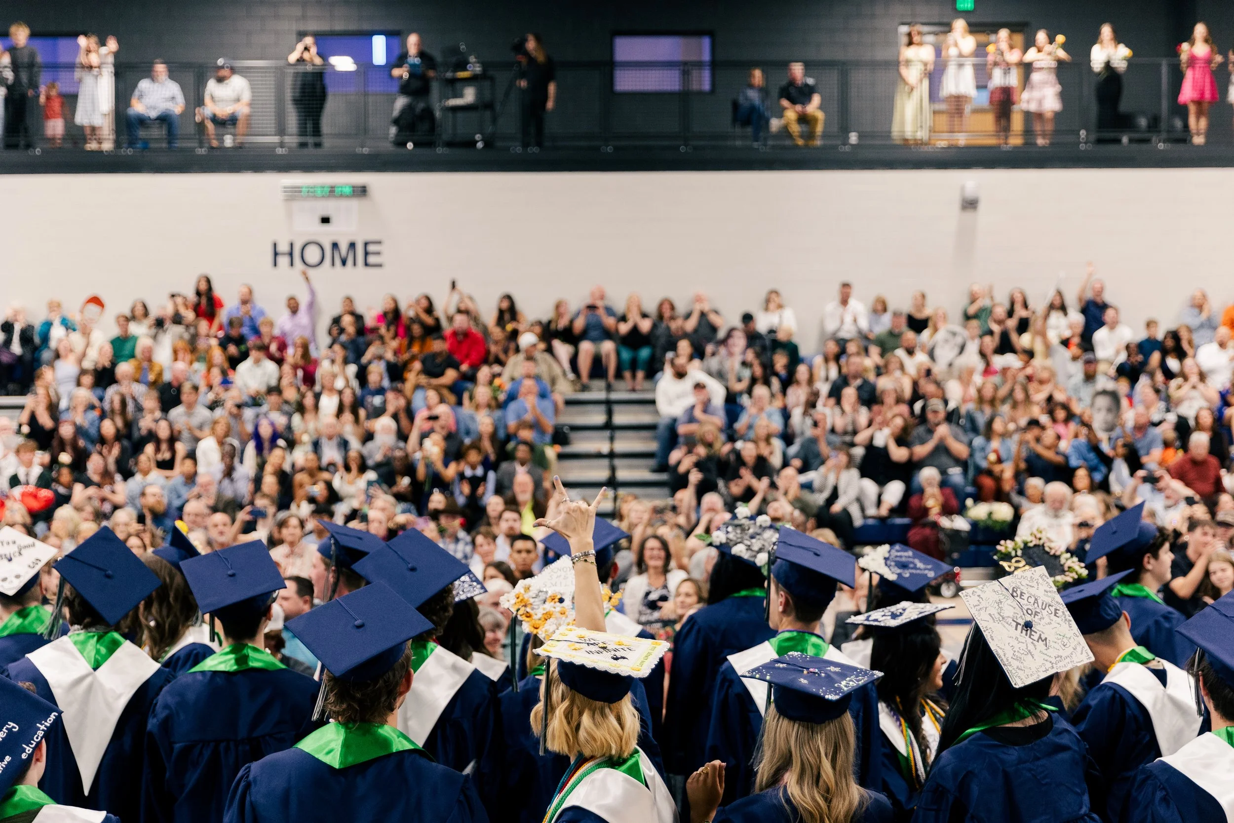 Graduates facing the audience at the 2025 High School Graduation