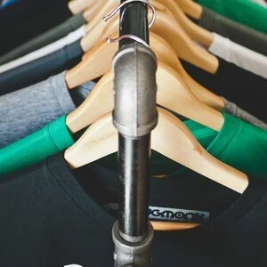 Sweaters on a hanger in multiple colors