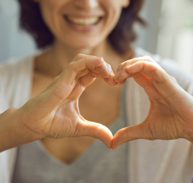 Woman making a heart with her hands