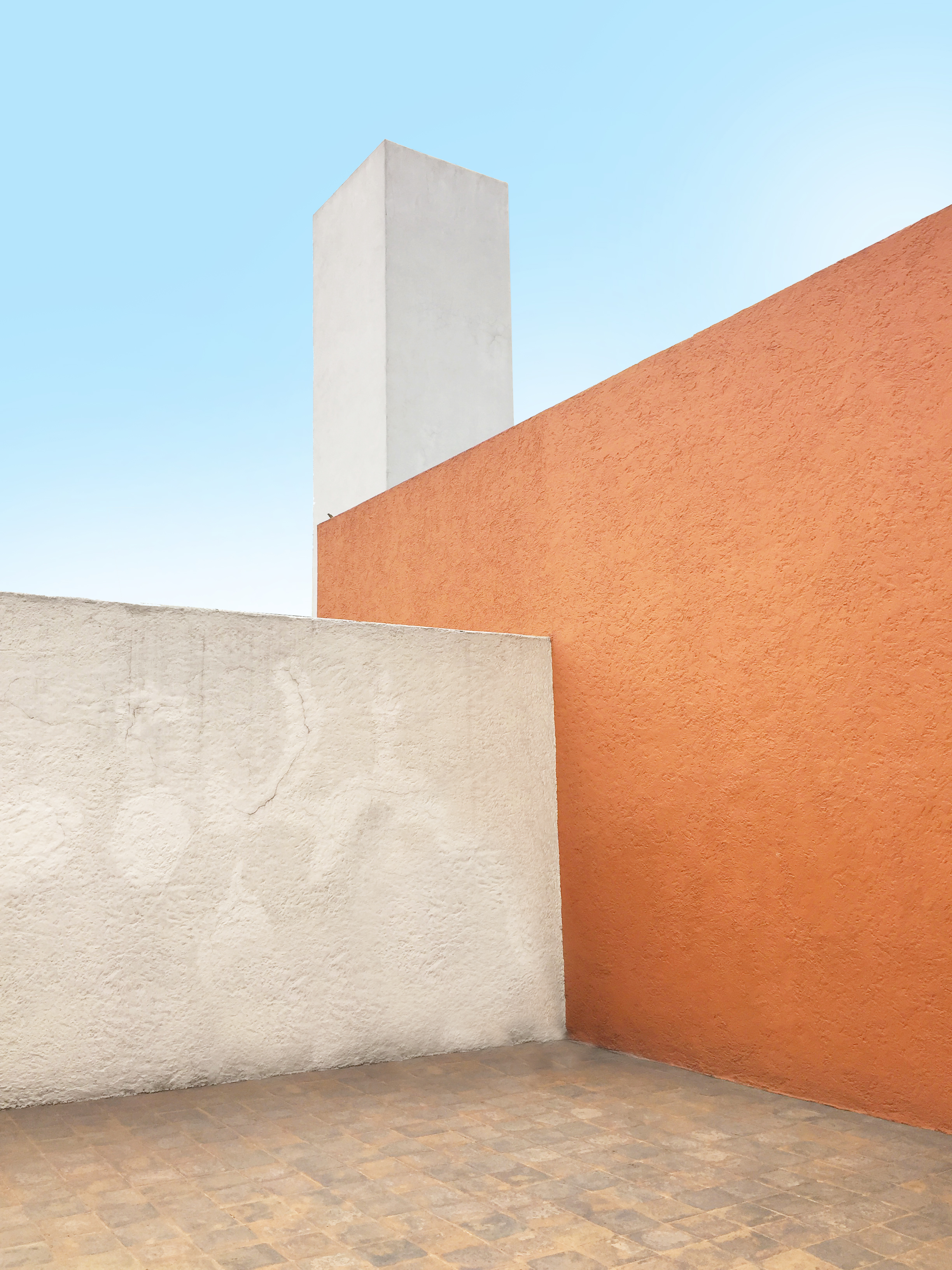 The rooftop was meant for quiet contemplation. High walls obstruct city views. Its just you and the sky up here.