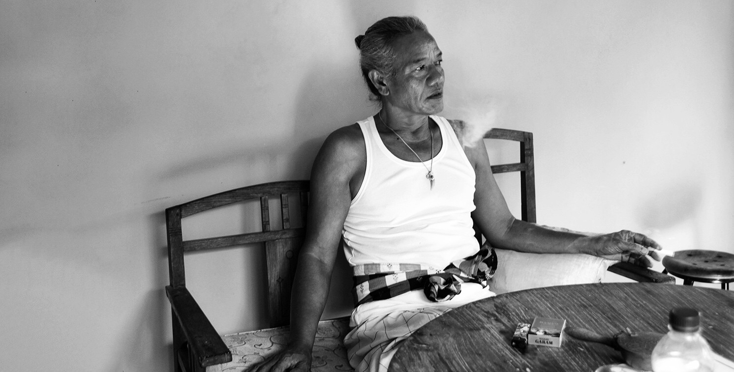 Pak Man smoking cloves cigarettes before our session . Ubud, Bali in April 2016.