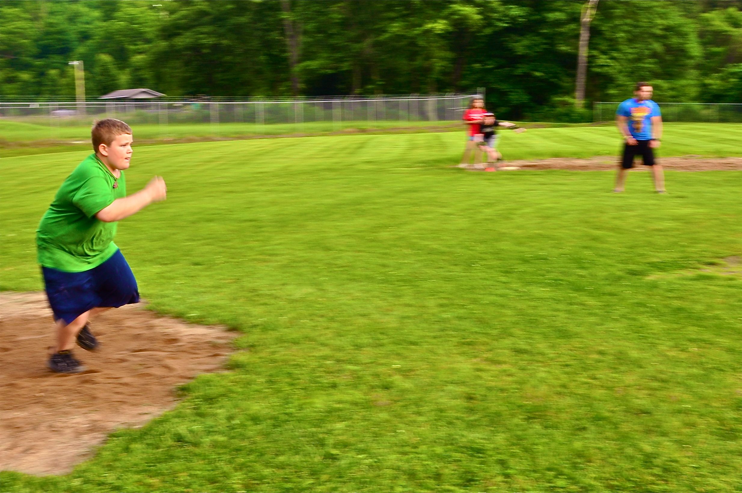 matthew-runs-toward-first-base-after-a-fantastic-kick.jpg