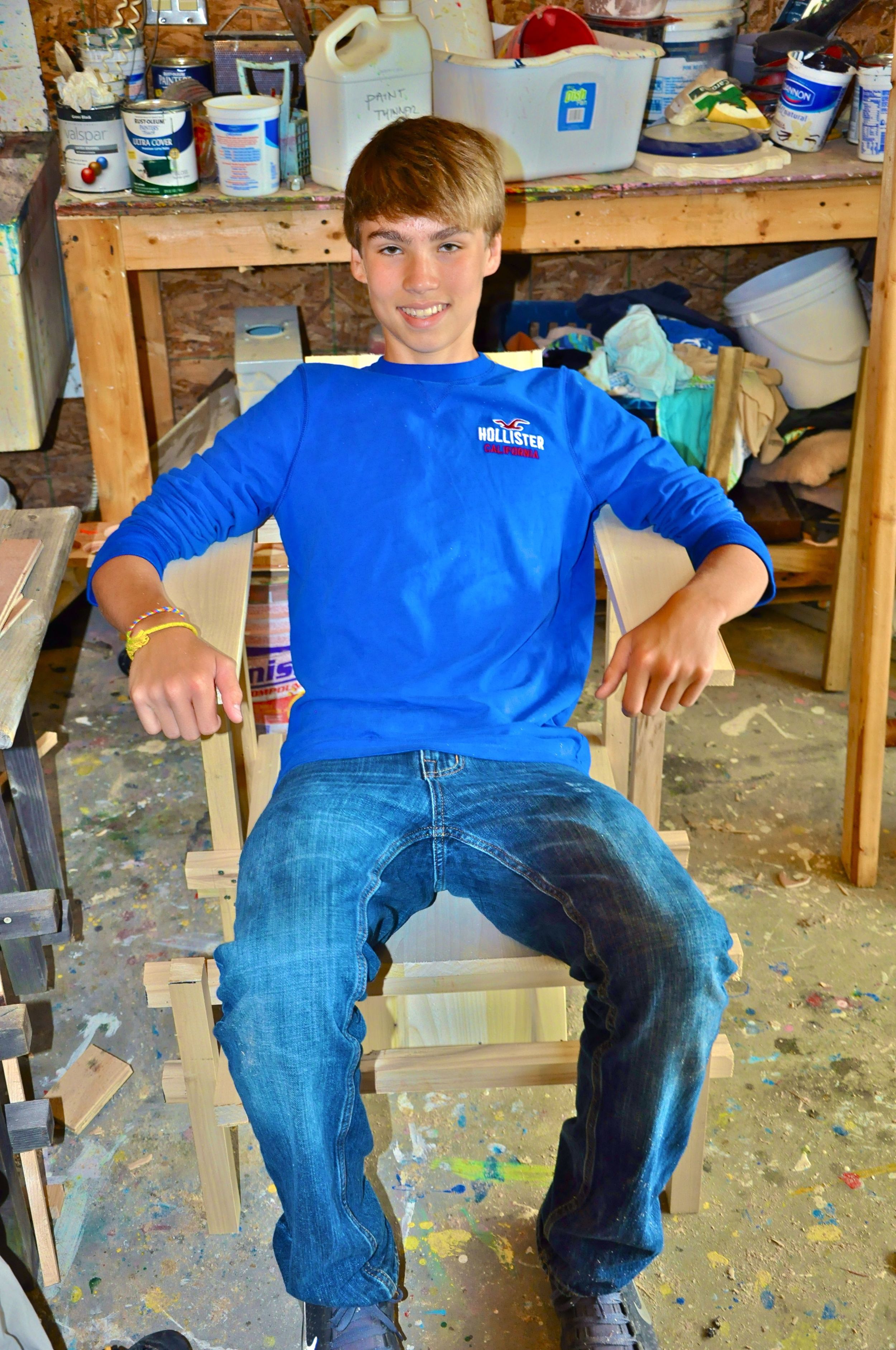 bruce-sitting-in-his-chair-that-he-made-during-woodshop.jpg