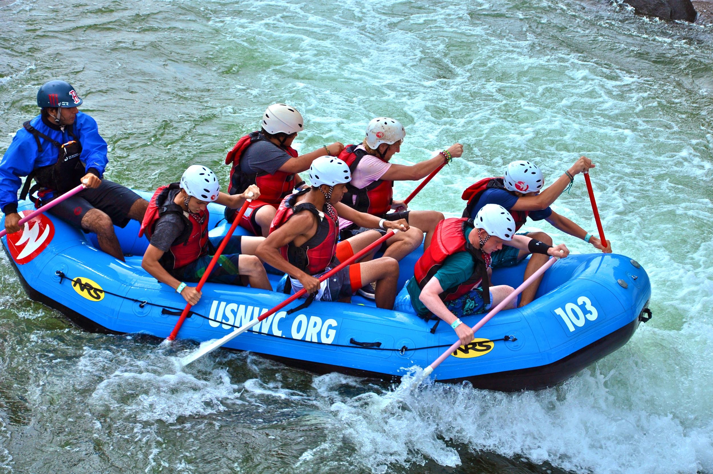 bruce-travis-greg-rob-olson-and-chase-power-into-the-rapids-for-a-speedy-trip-down-the-man-made-river.jpg