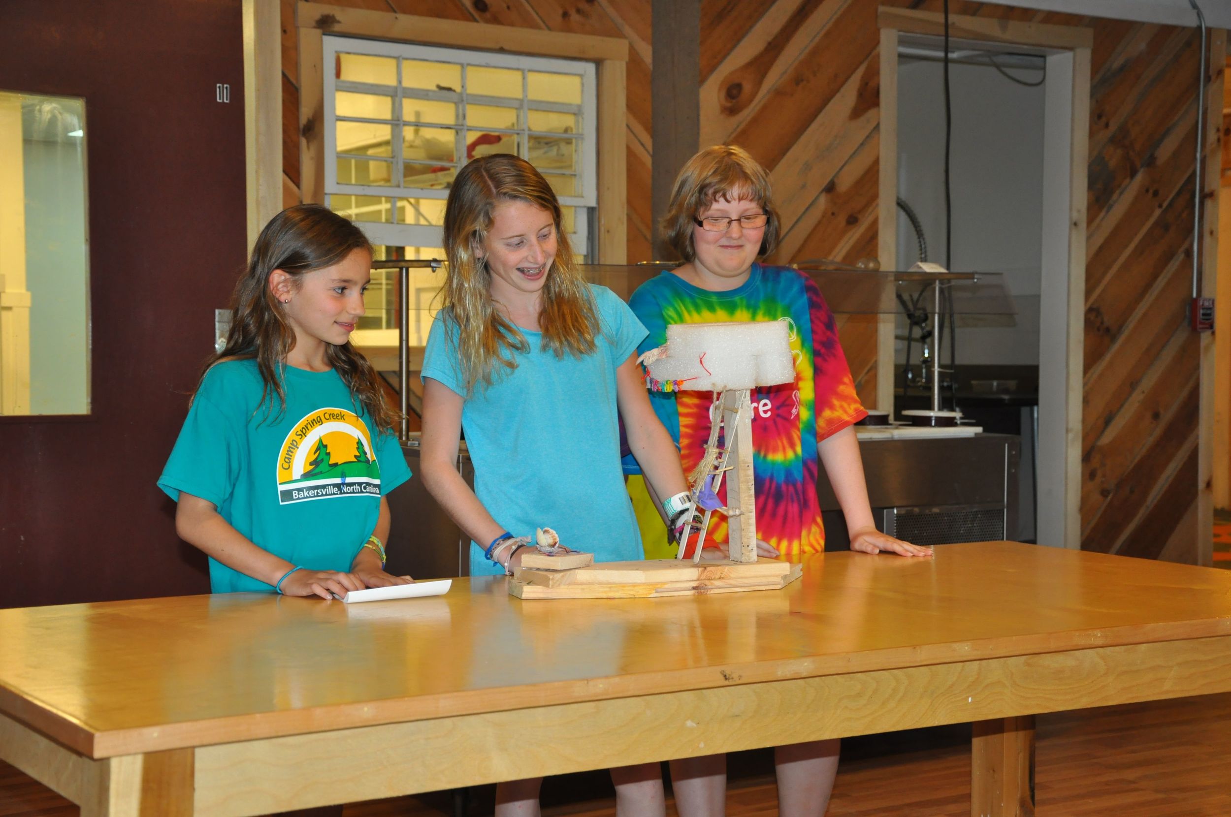 bella-emily-and-kristin-display-their-junk-sculptures-during-skit-night.jpg