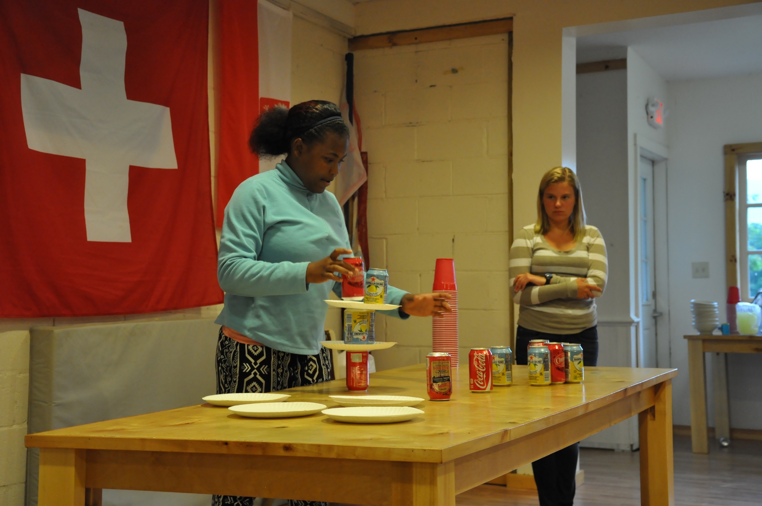 making-a-reverse-pyramid-out-of-paper-plates-and-aluminum-cans.jpg