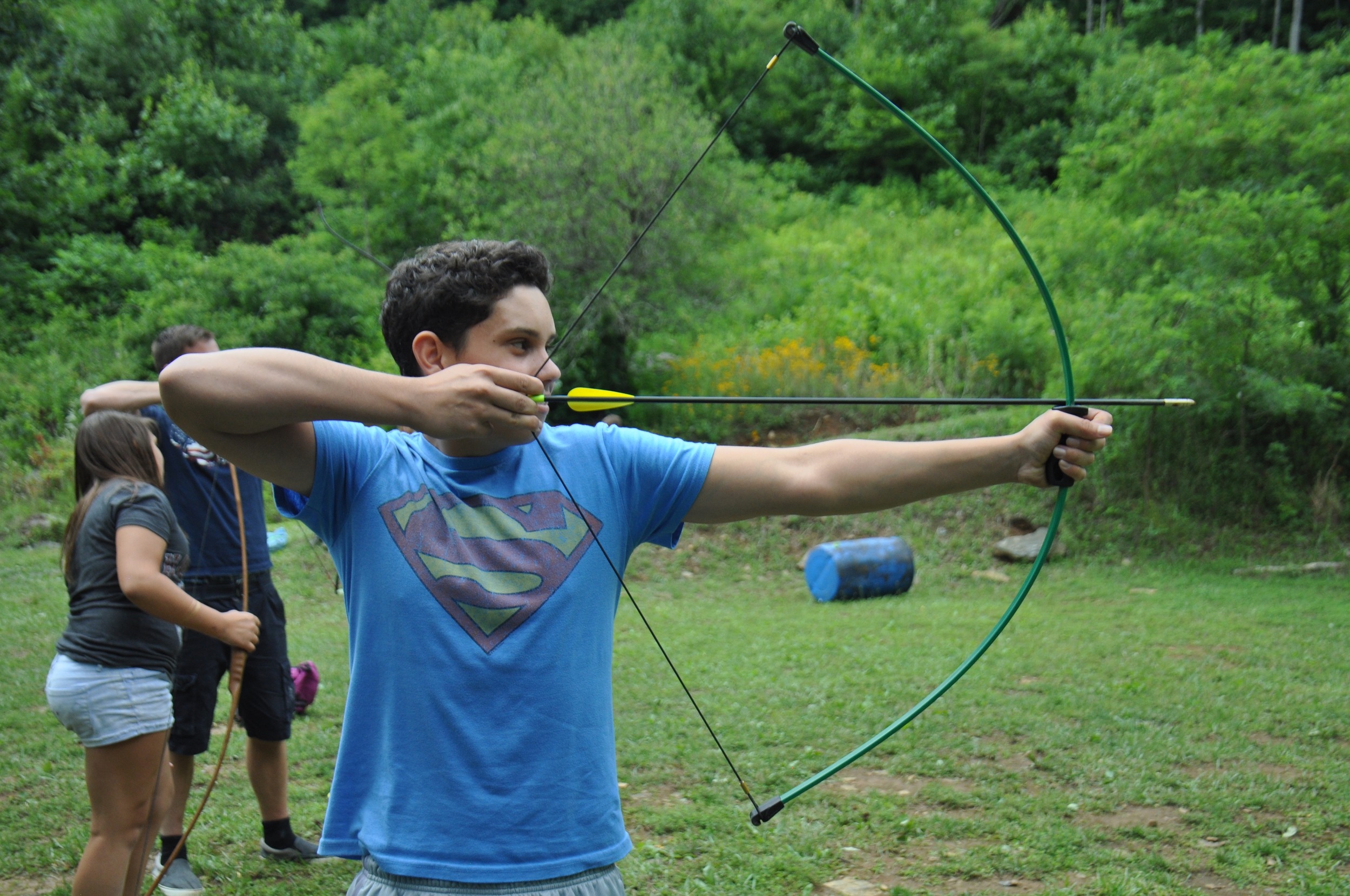 ethan-draws-back-his-bow-and-aims-for-the-bullseye.jpg