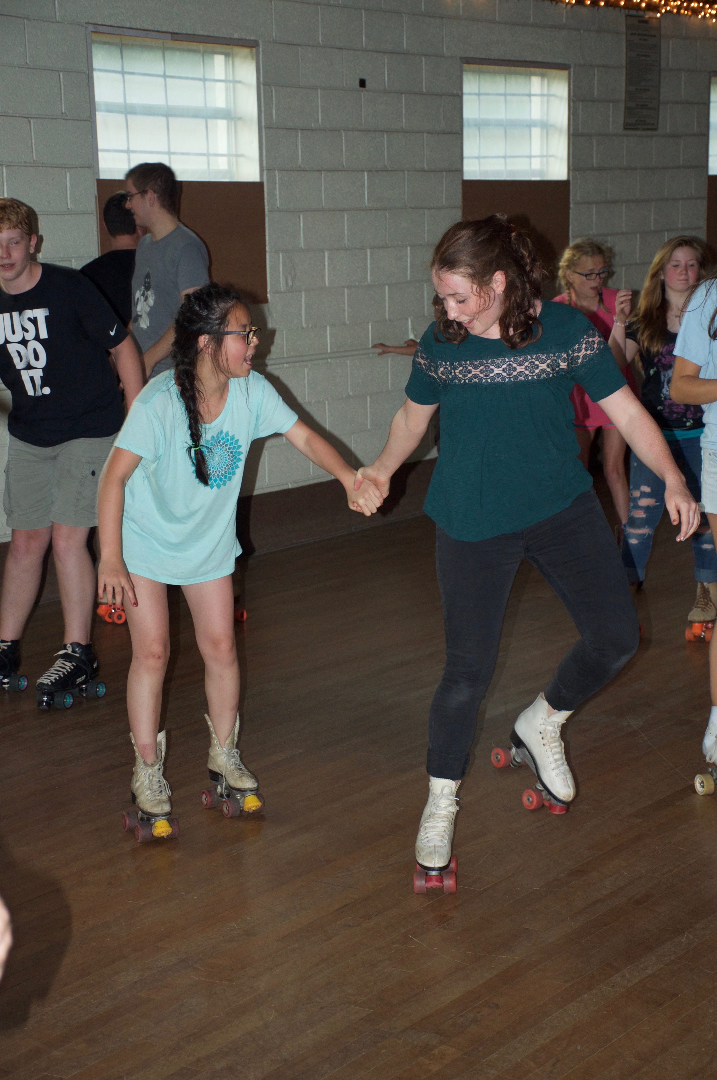 K. and G are getting the hang of rollerskating. 