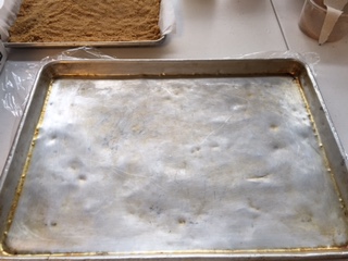 Press down hard to get a compact crust.