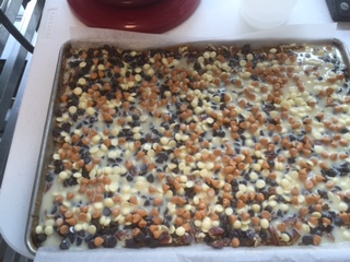 Pour condensed milk evenly over the surface