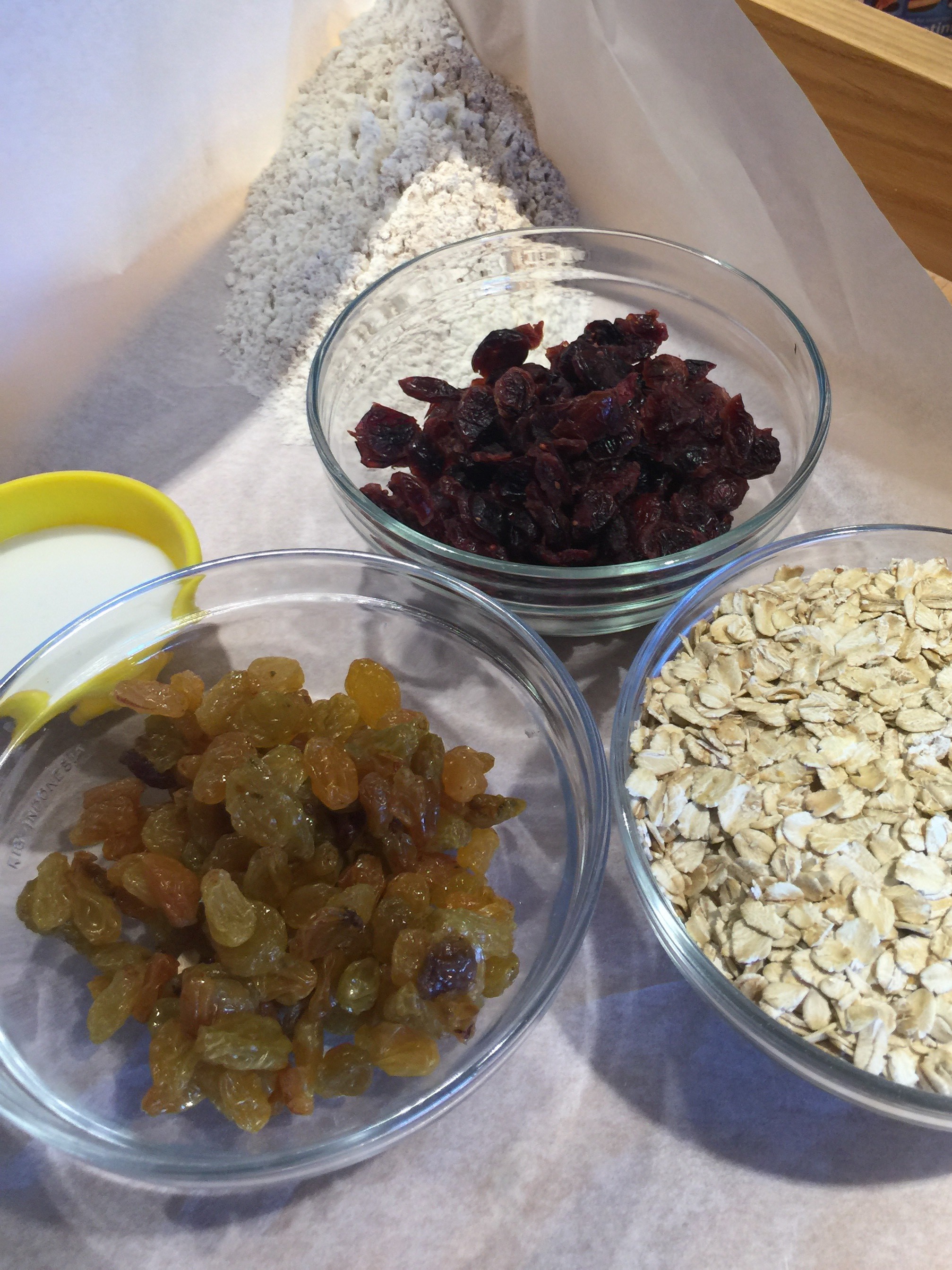 Dry ingredients plus milk, raisins and cranberries waiting their turn...