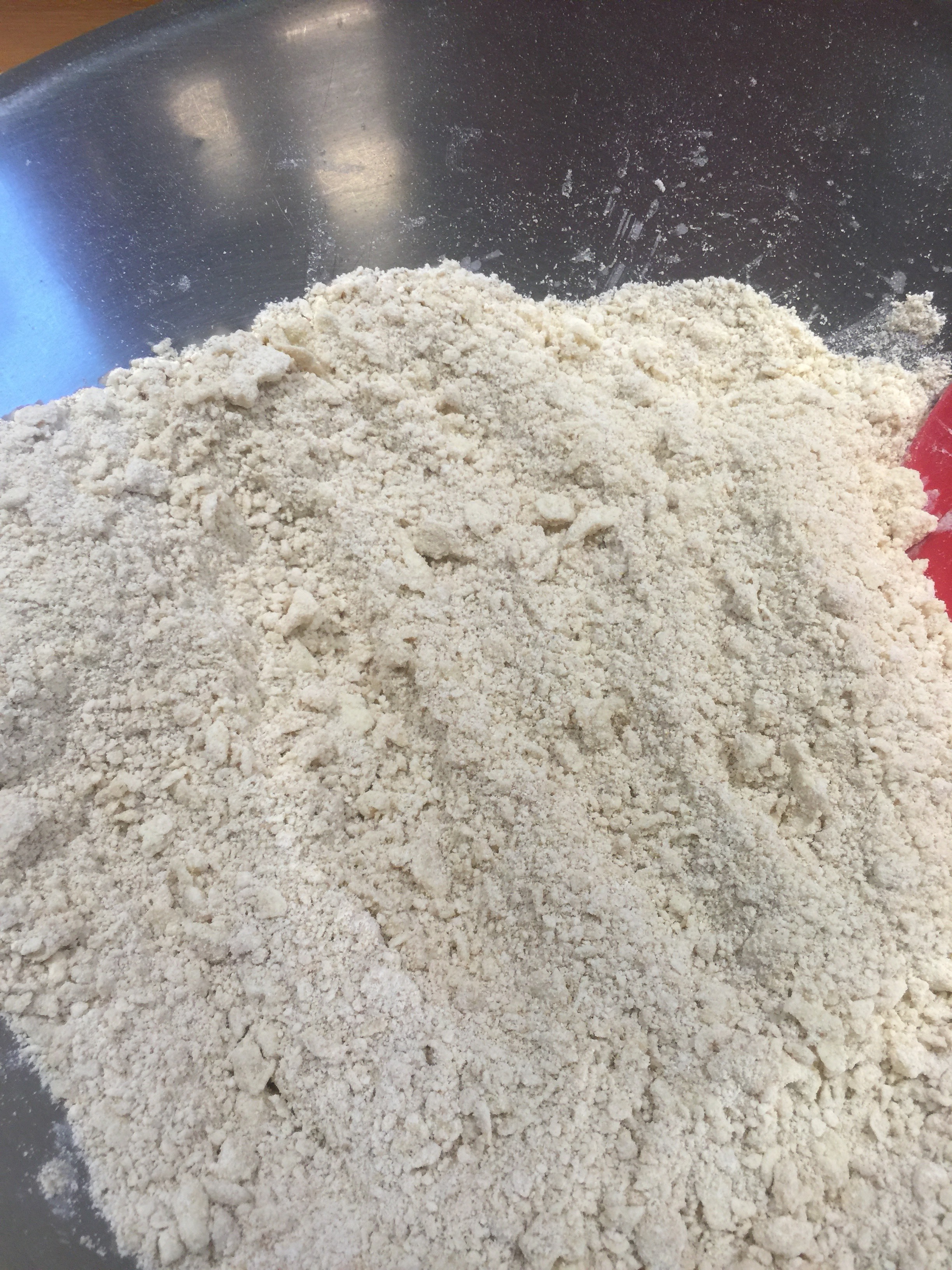 Cut in butter - texture is like coarse meal